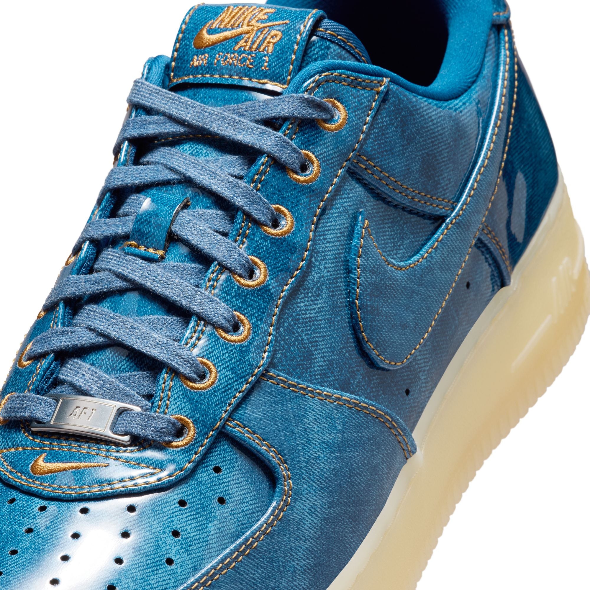 blue and tan sneakers on a white background
