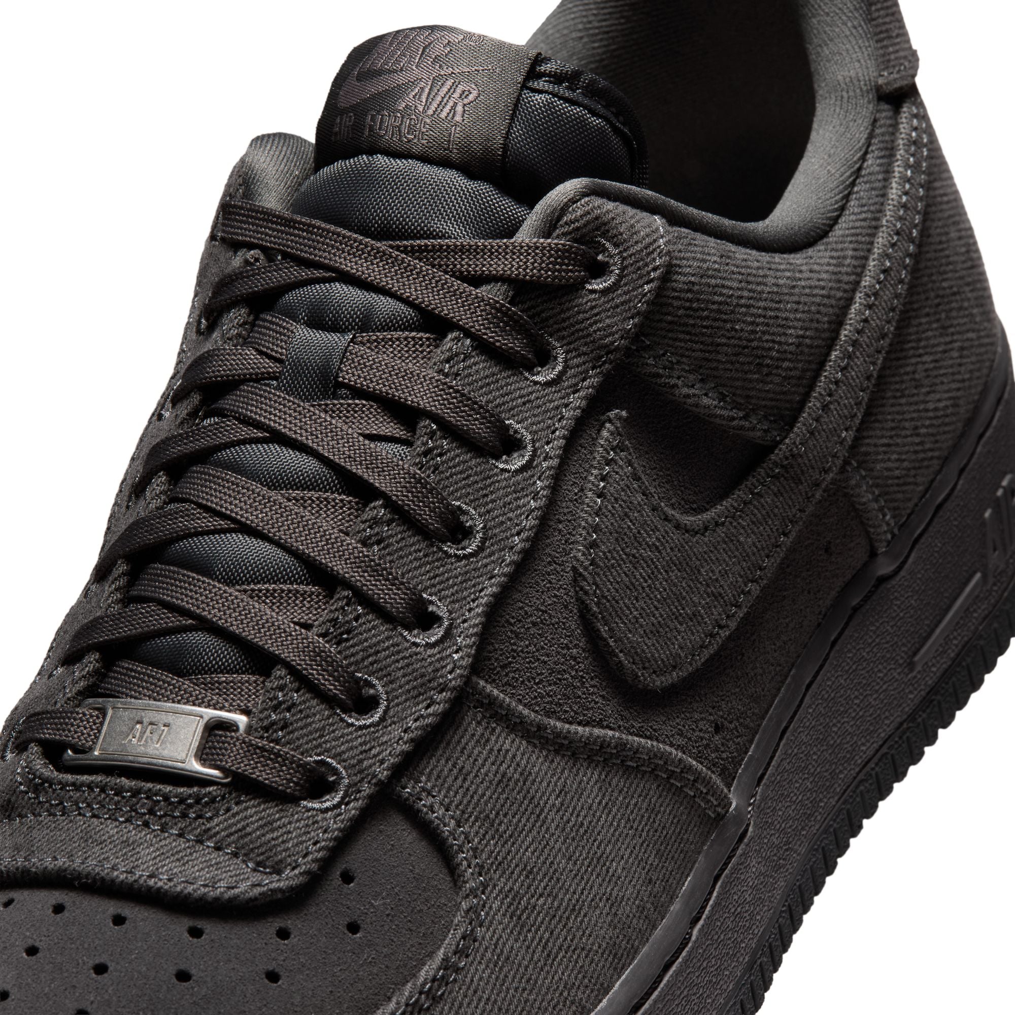 Anthracite denim sneakers on a white background