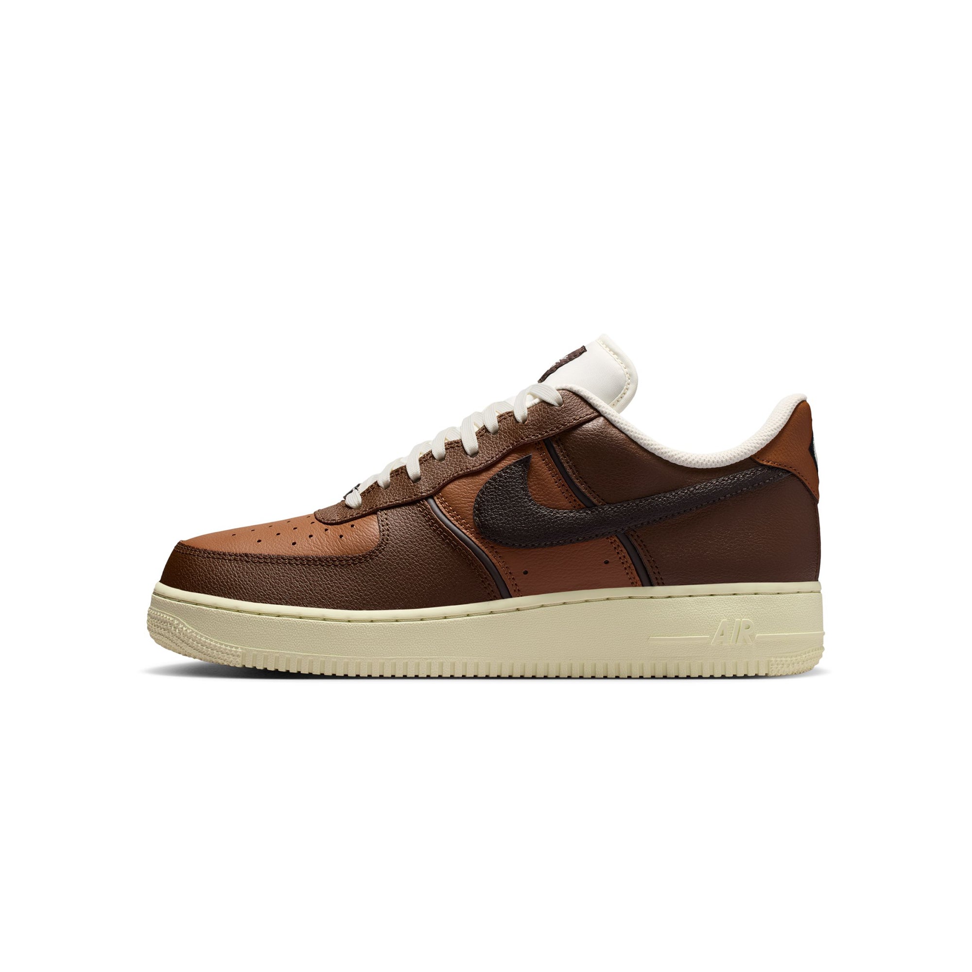 brown and tan sneakers on a white background
