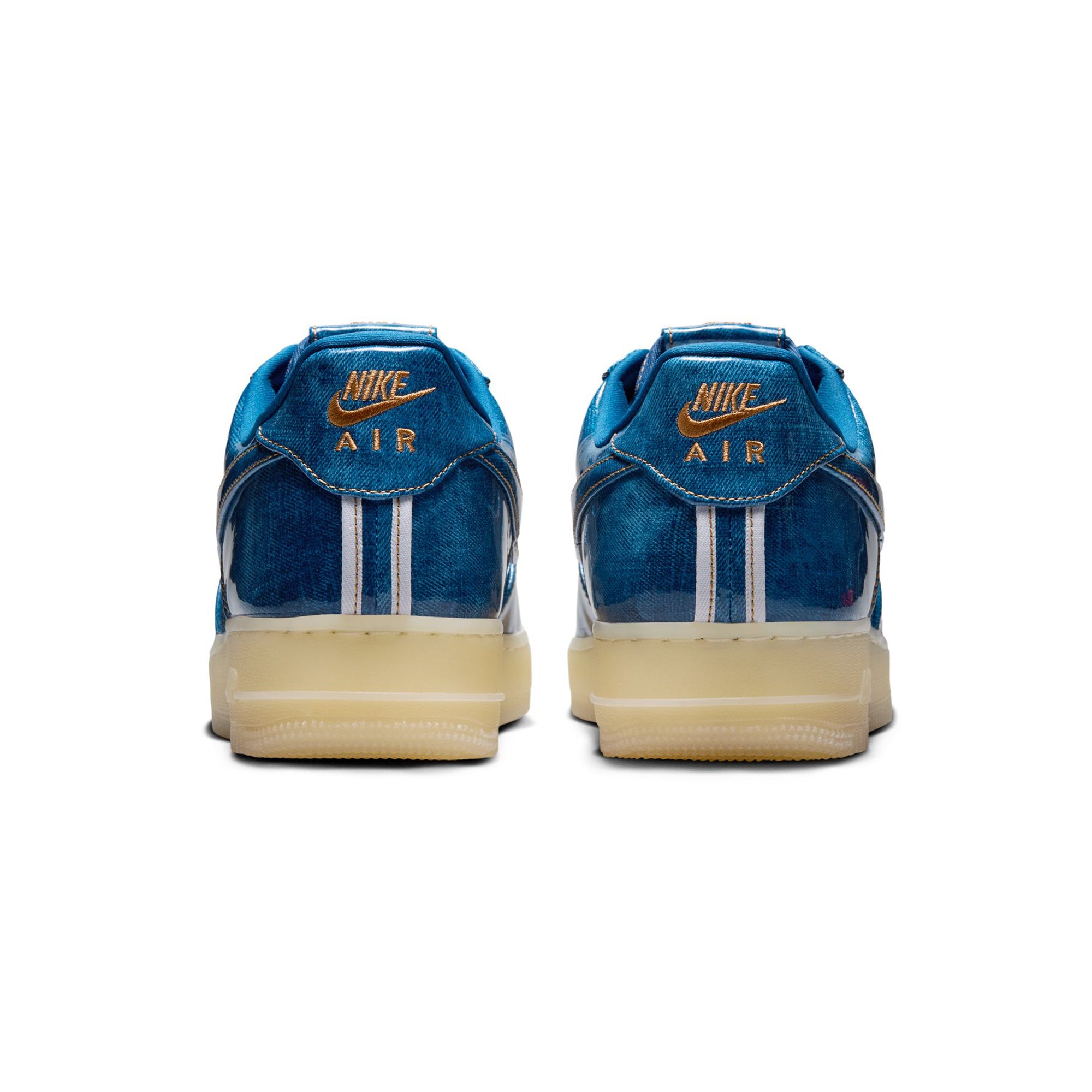 blue and tan sneakers on a white background