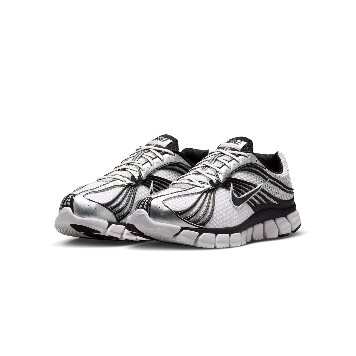 white and black sneakers on a white background