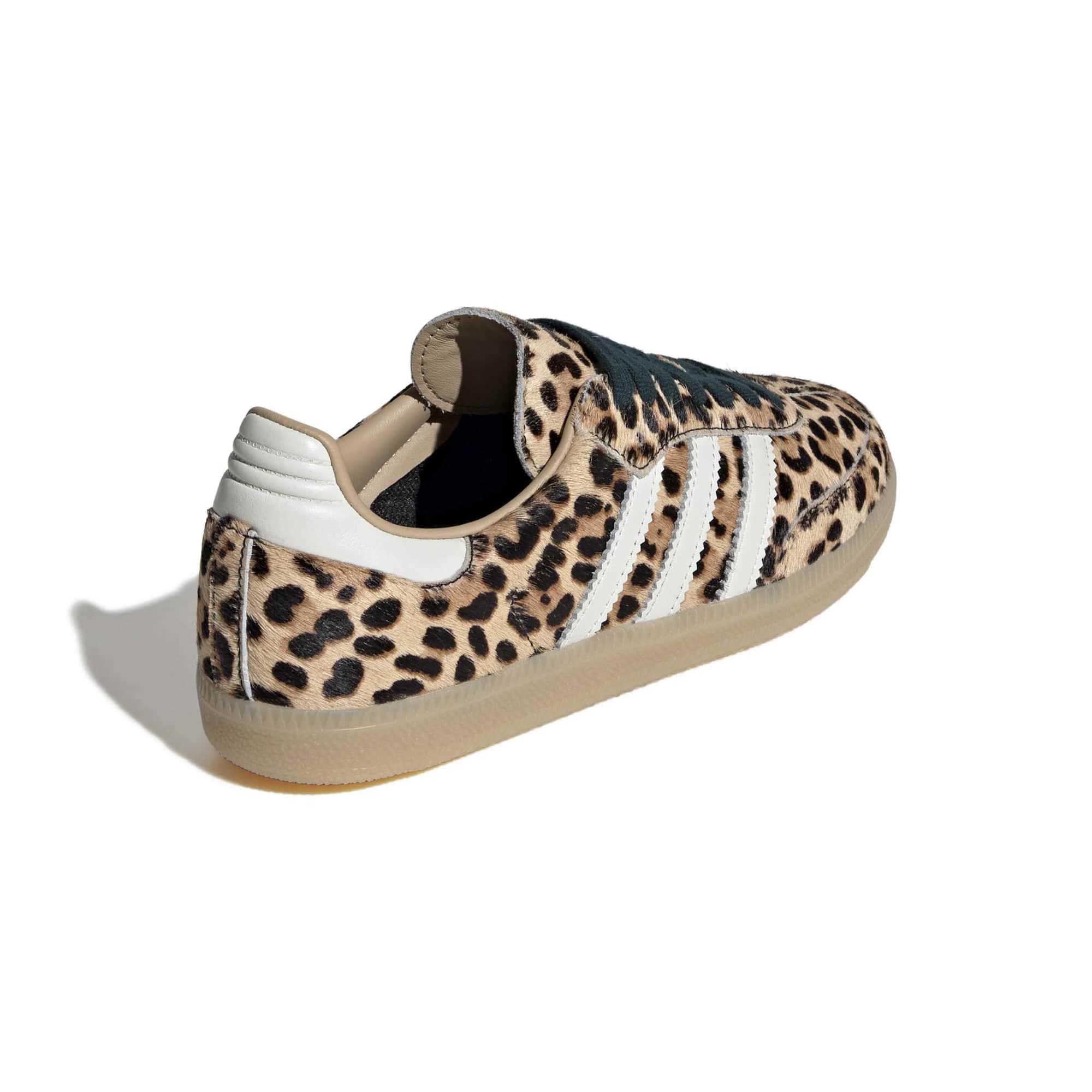 cheetah print sneakers on a white background