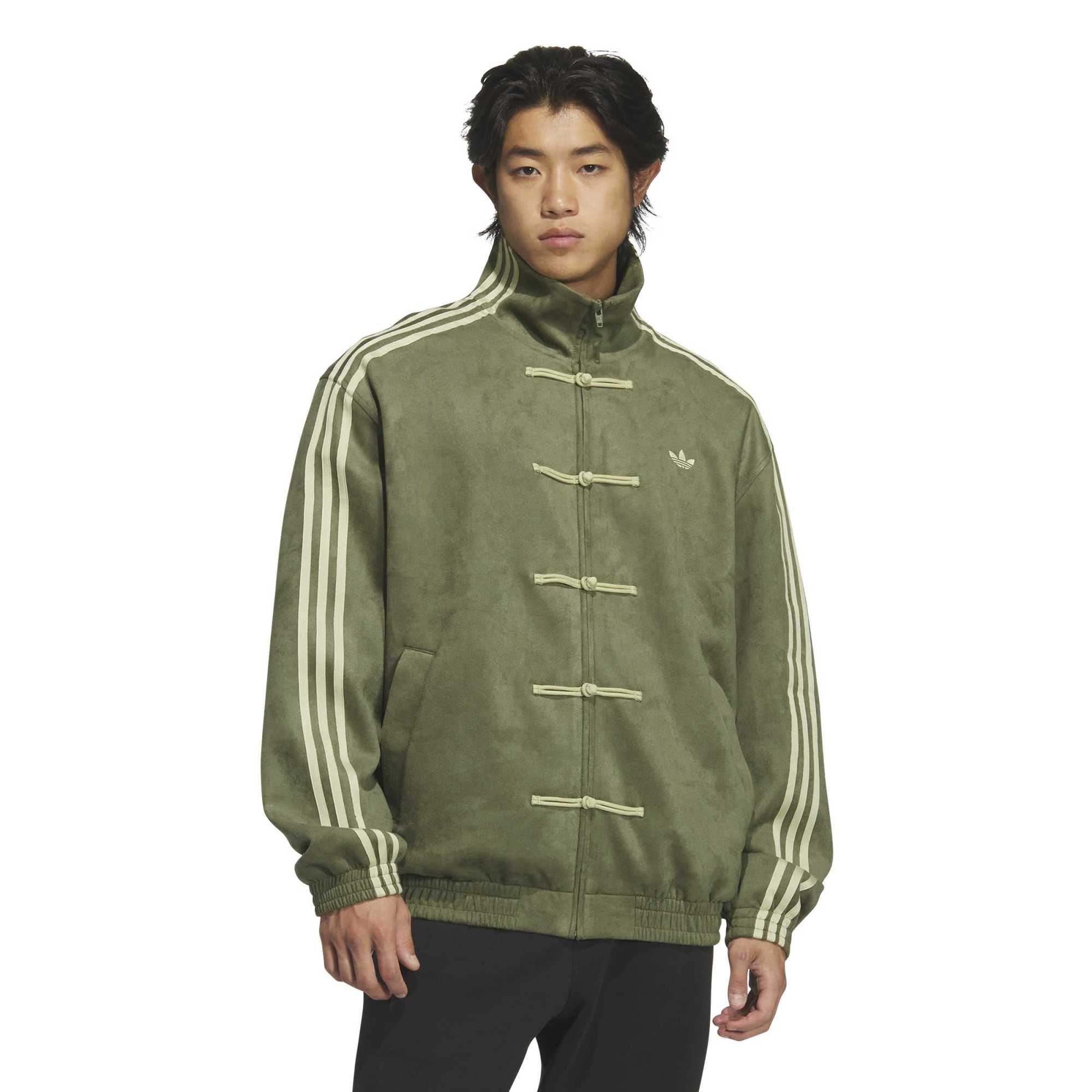 person wearing olive jacket on a white background
