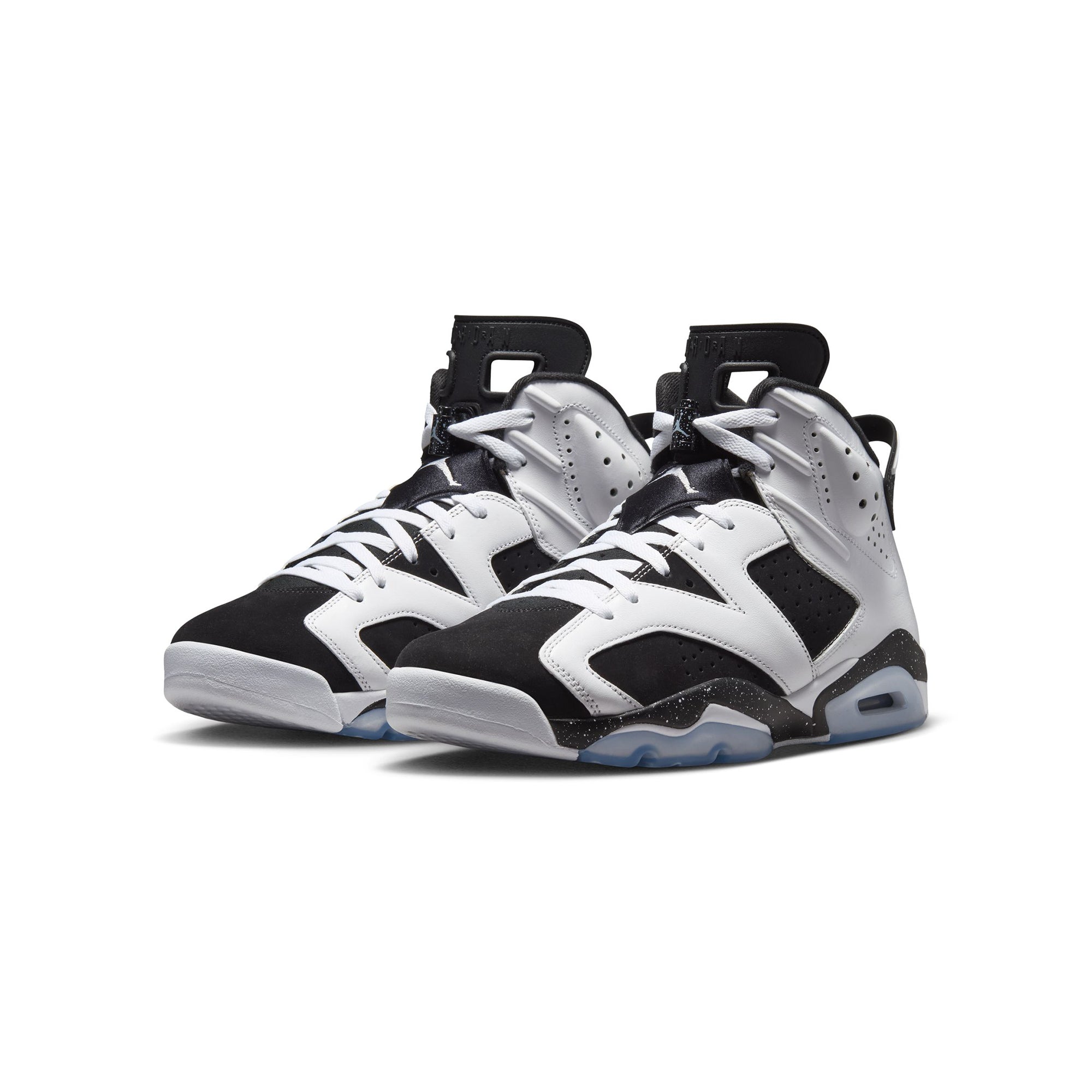 black white and ice blue sneakers on a white background