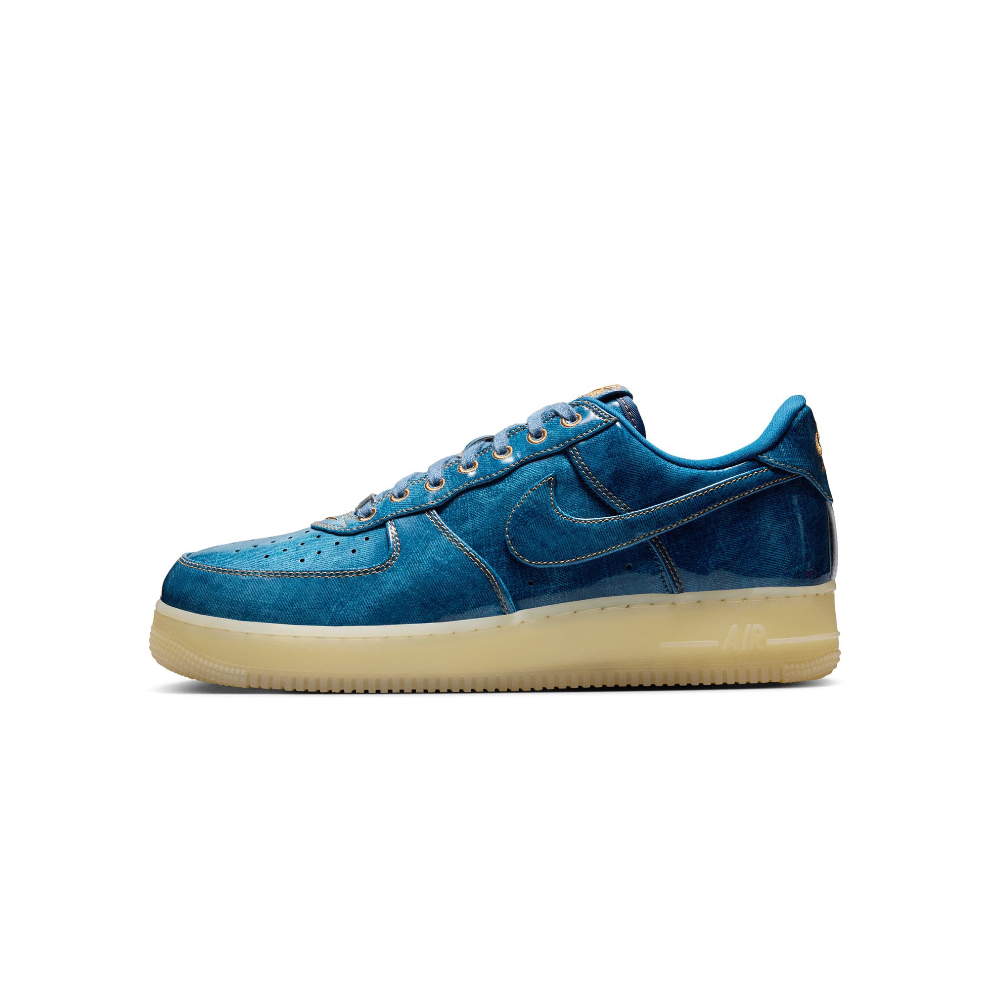 blue and tan sneakers on a white background