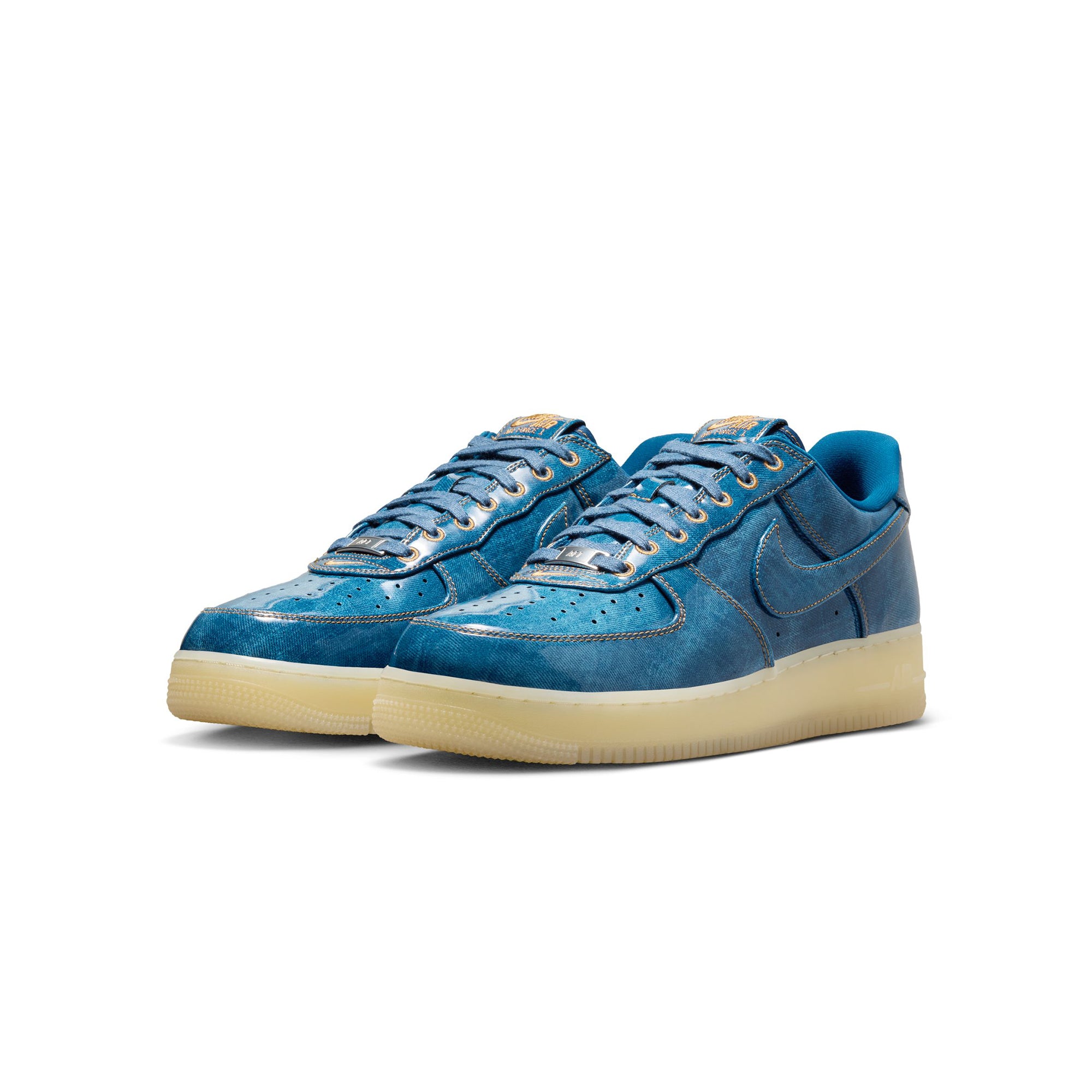 blue and tan sneakers on a white background