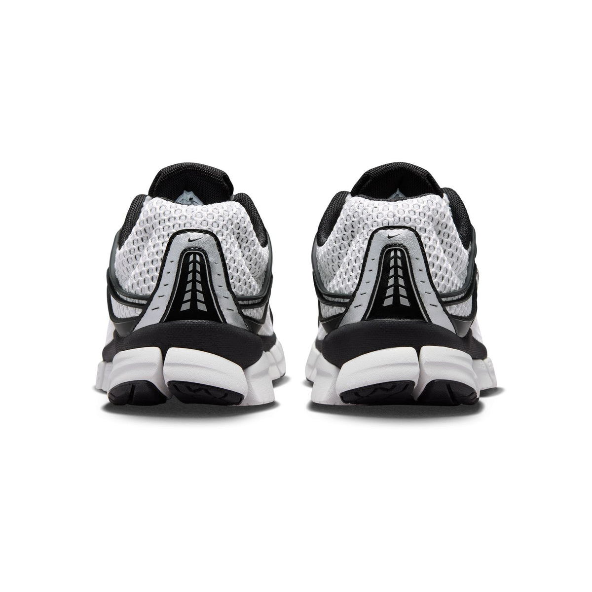 white and black sneakers on a white background