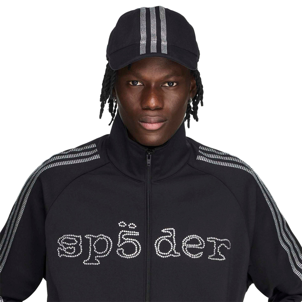 black and silver rhinestone track jacket on a white background 